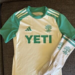 YETI Austin FC Youth Green and Tan Armadillo kit Shirt and socks